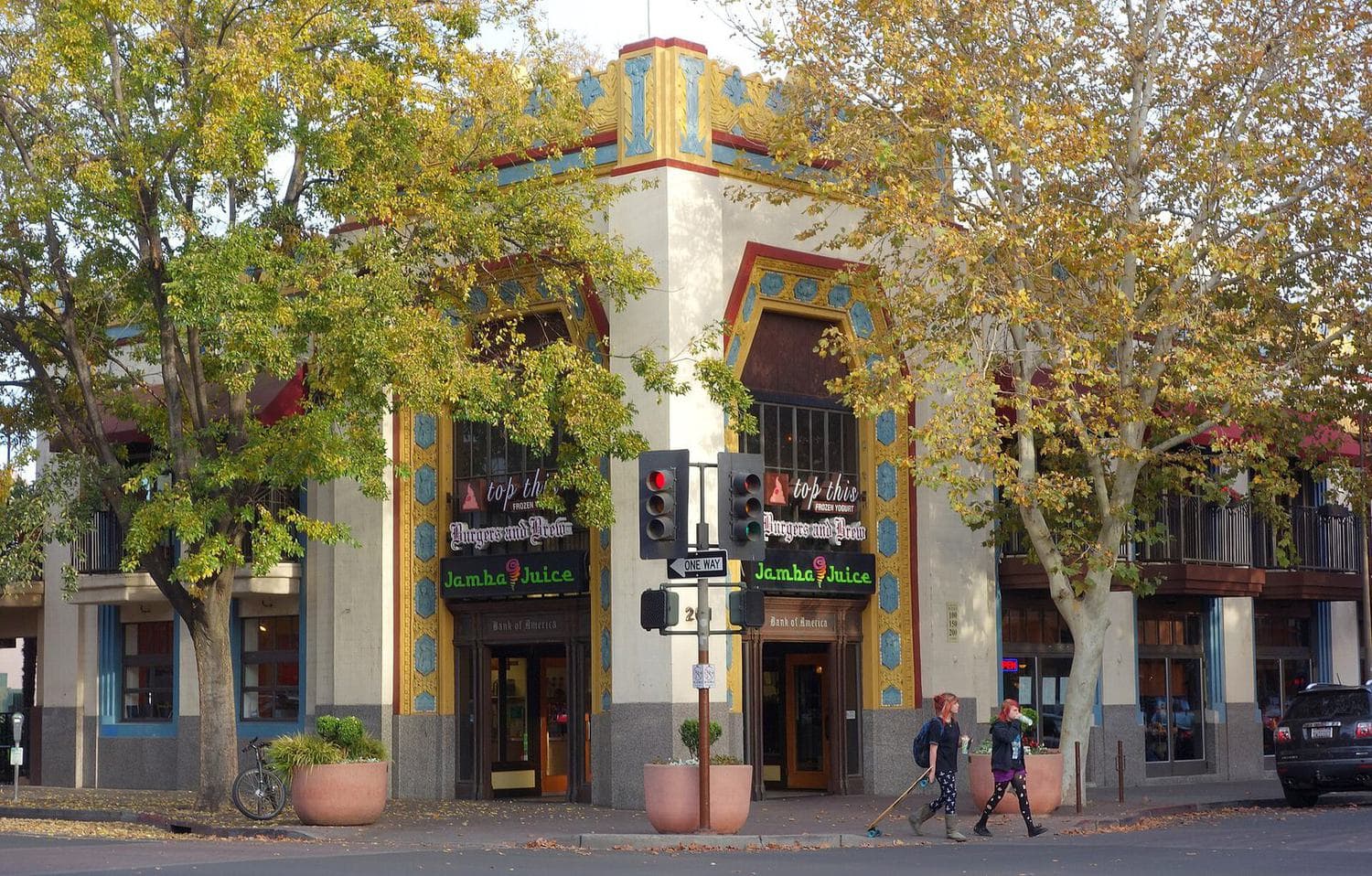 Art deco corner building with ground-floor storefront windows on Broadway Street in downtown Chico, California